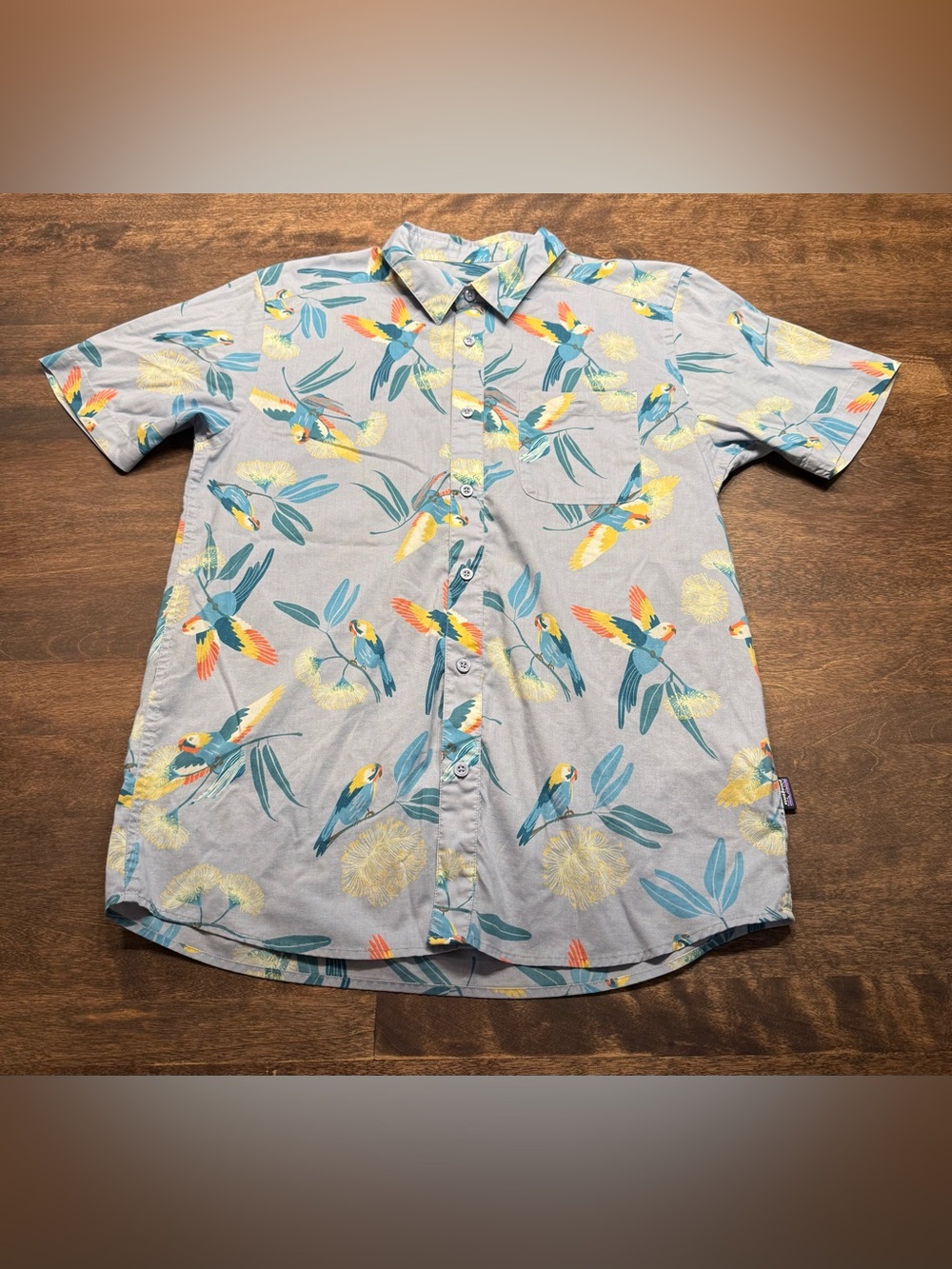 Patagonia Men's Organic Cotton Blue Parrot Print Short Sleeve Polo Shirt